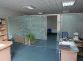 Glass partitions with sliding doors